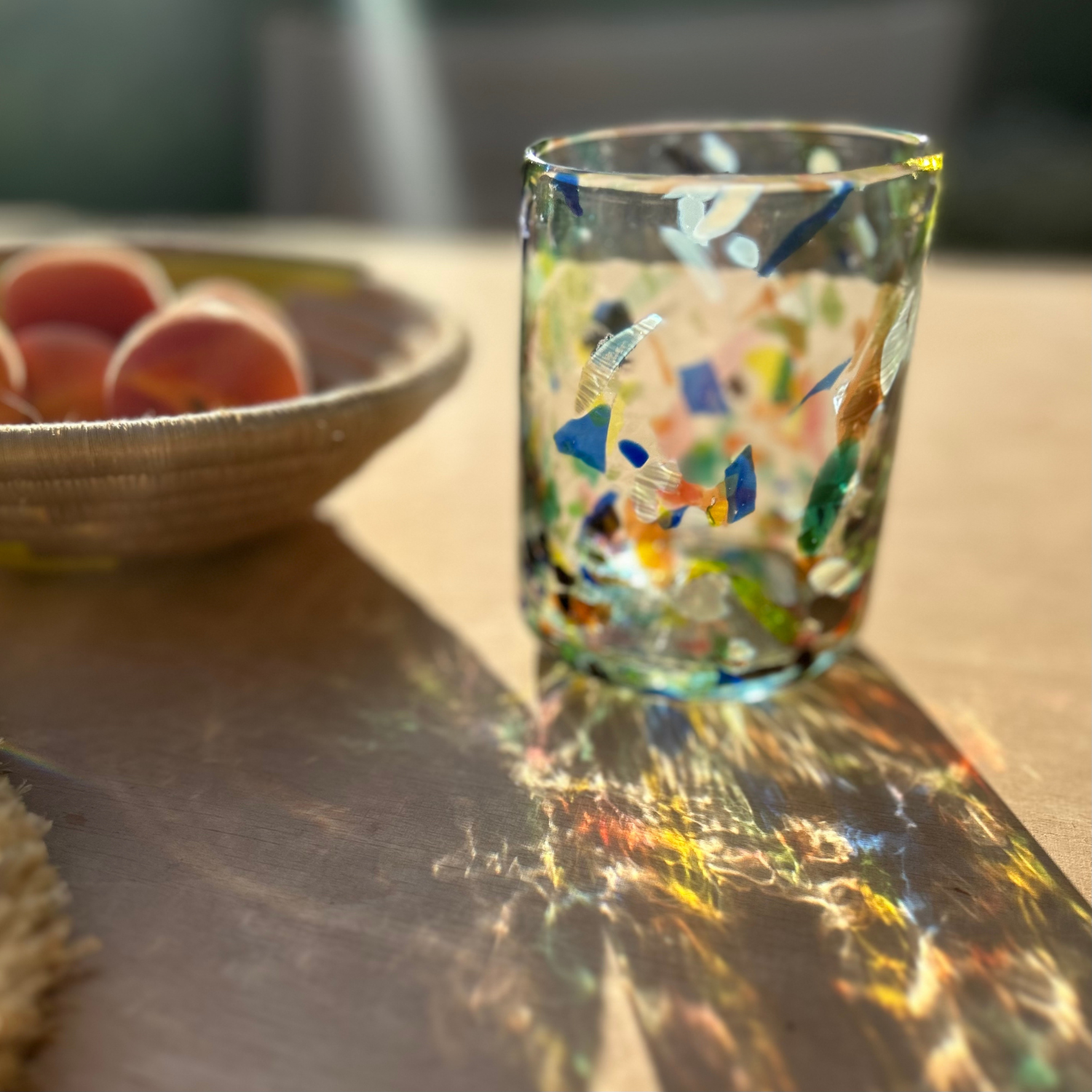 Terrazzo drinking glass in the sunlight - By Native