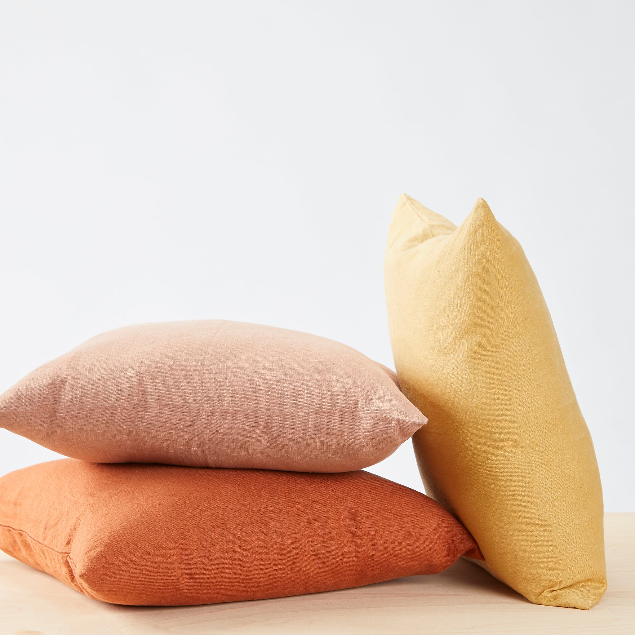Ambience pillows in honey yellow,terra and canyon.