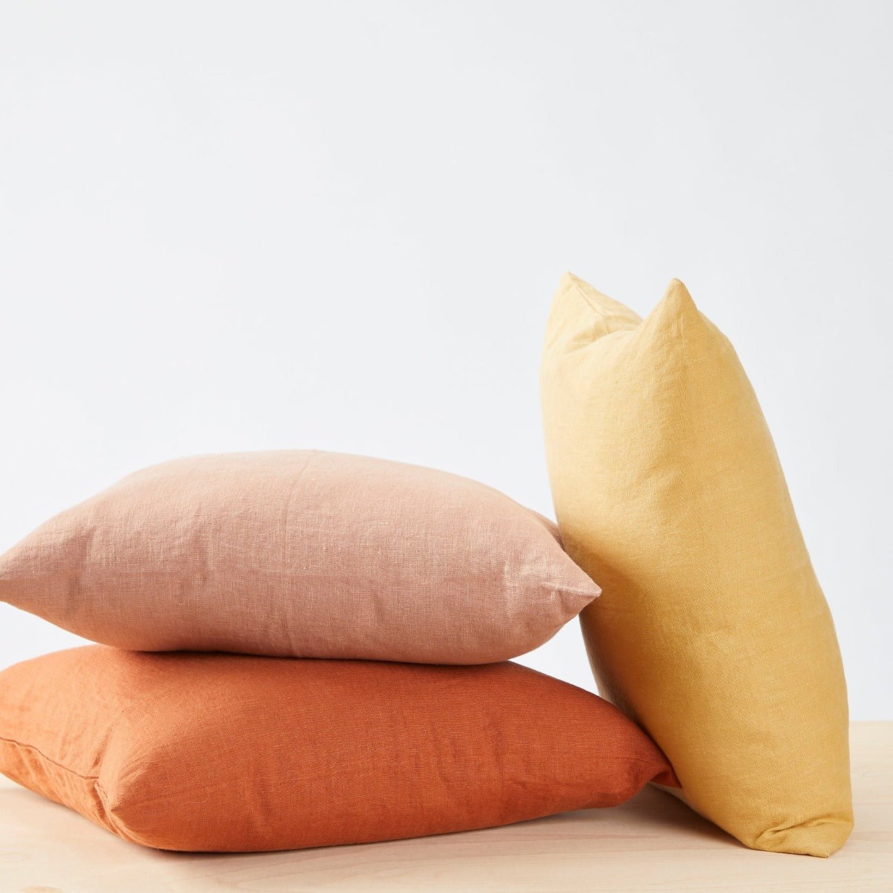 Ambience pillows in Honey, Terracotta and Canyon Clay.