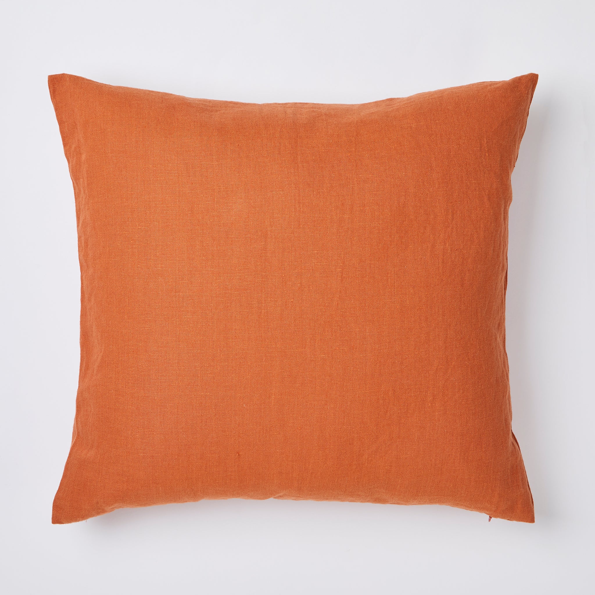 Linen cushion in color terra