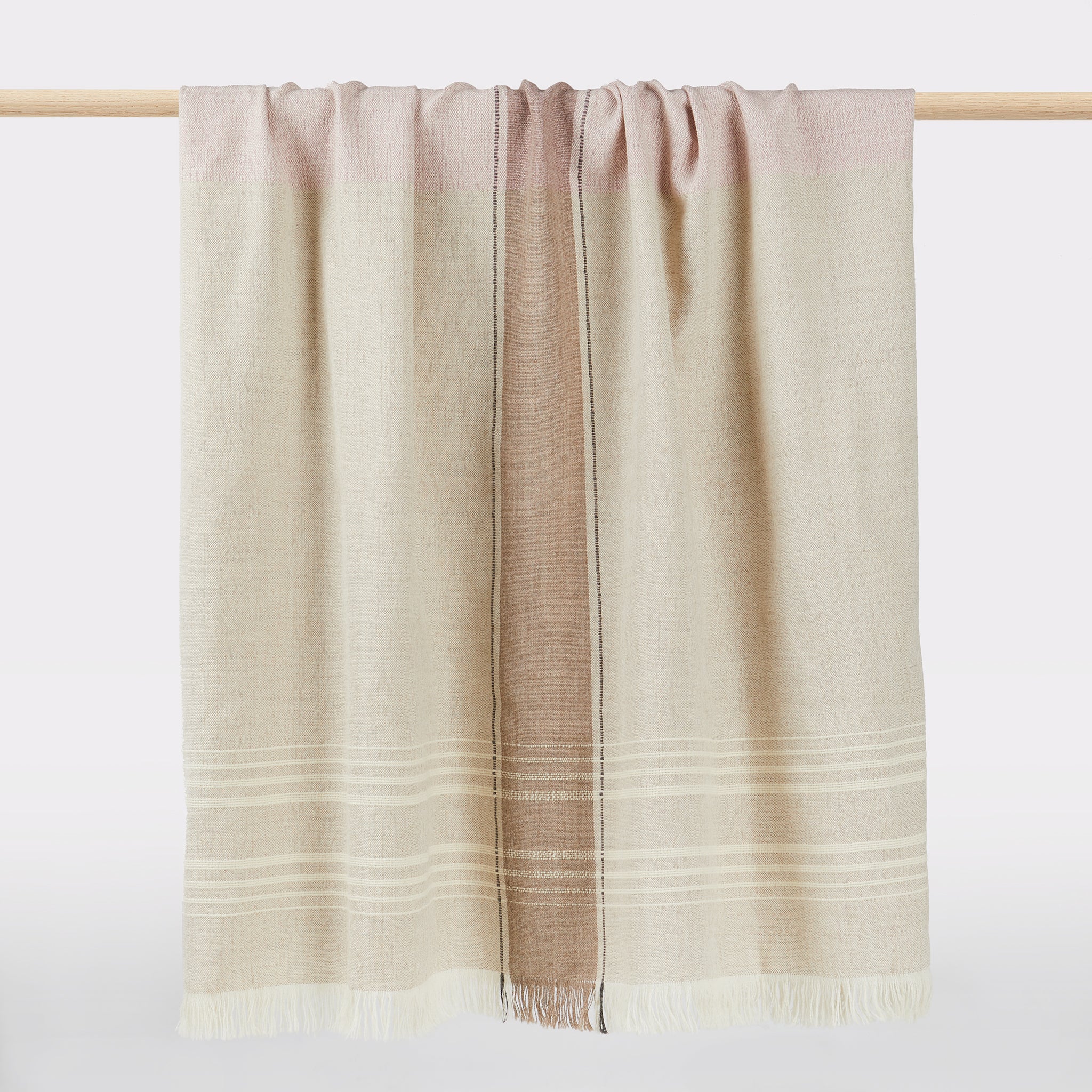 Handwoven for By Native in Peru: Beautiful baby alpaca blanket in the colour combination grey, beige, natural and antique pink with eyelash fringes and high relief stripes. Size: 178 x 128 cm Colours: Grey / Beige / Nature / Old Pink