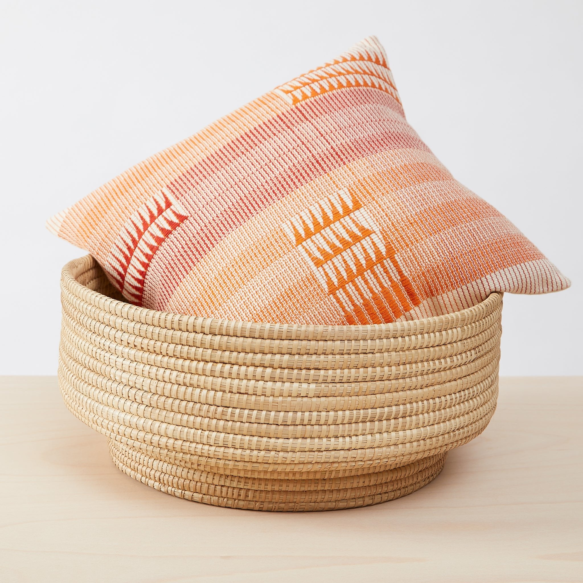 Large basket Dengu made of rattan woven by hand. Here with cushion Nagaland.  Cushion 
