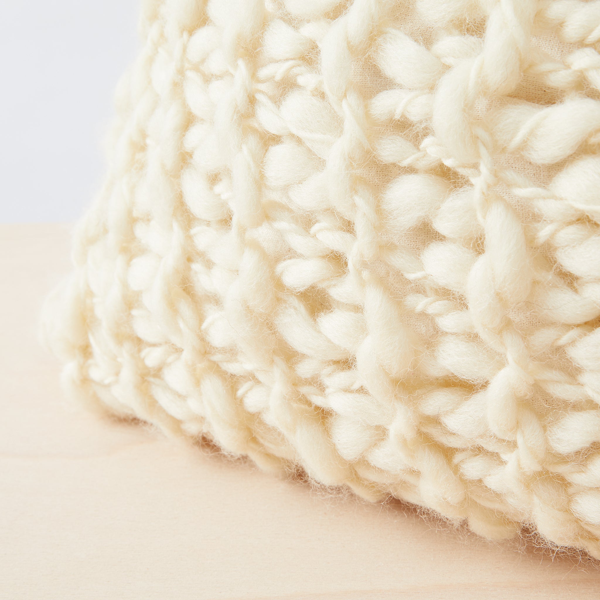 Cushion Animana Detail, handwoven_of 100% merino wool, natural white