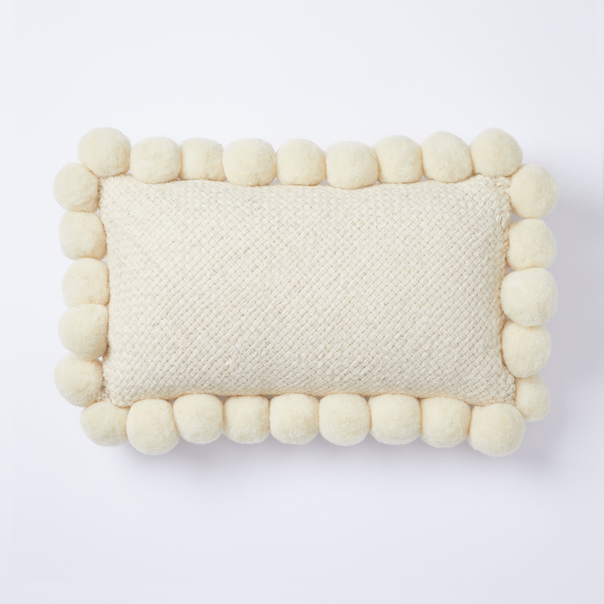 Pompom cushion rectangle of virgin wool - By Native