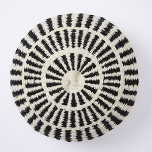 A great eye-catcher on your sofa or in your favourite armchair. Individual, lovingly handmade cushion made of 100% Argentinian sheep's wool with a traditional pattern in natural white and black.
