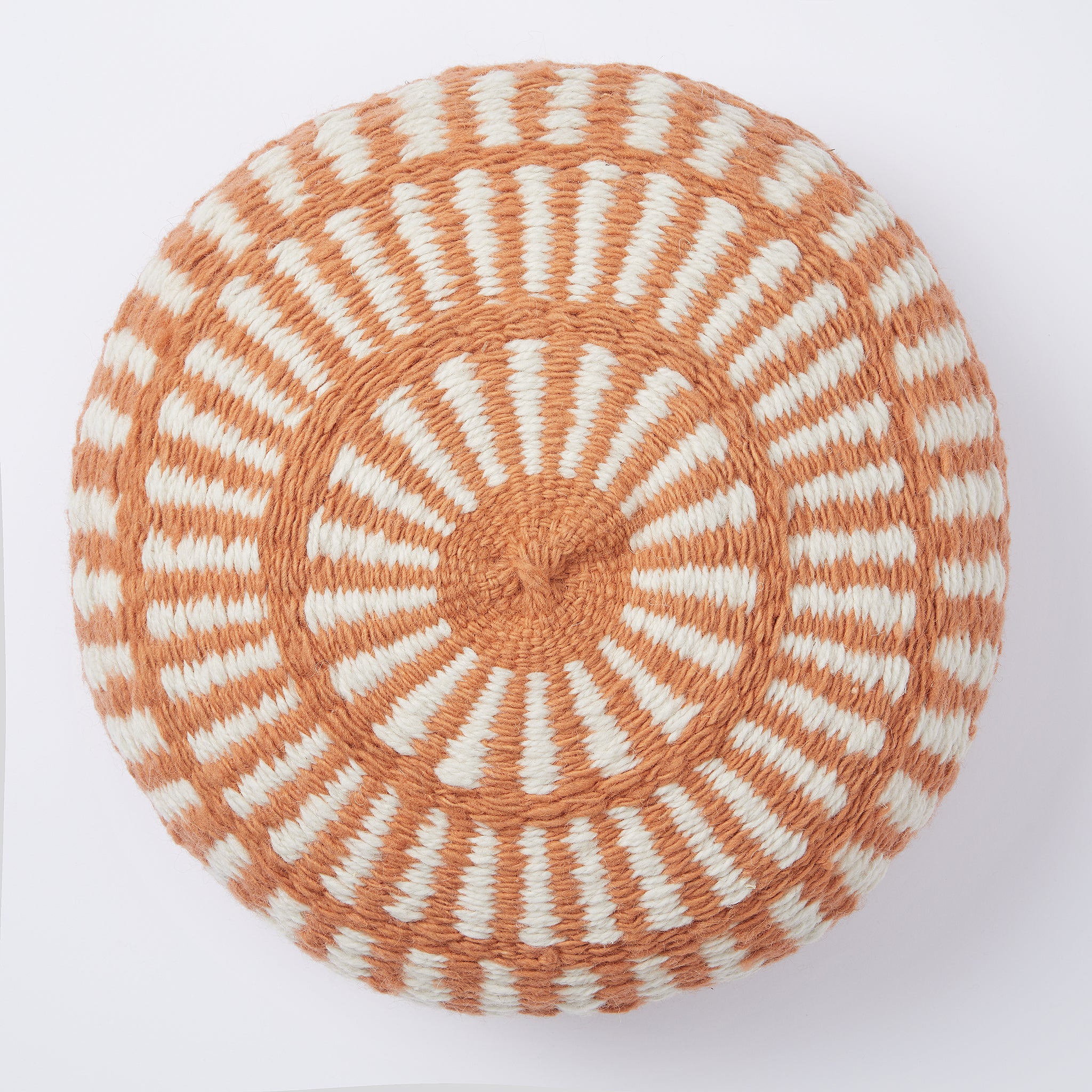 Salta Large cushion, natural white & burnt orange.  A great eye-catcher on your sofa or in your favourite armchair. Individual, lovingly handmade cushion made from 100% Argentinian sheep's wool with a traditional pattern.   This cushion comes ready styled with a vegan cushion filling.