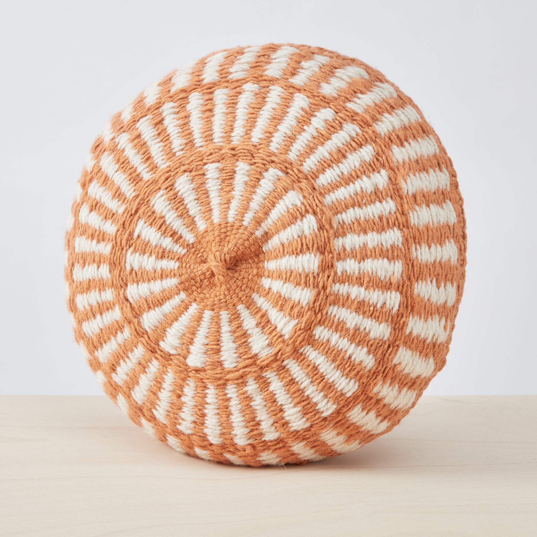 Salta Large cushion, natural white & burnt orange. A great eye-catcher on your sofa or in your favourite armchair. Individual, lovingly handmade cushion made from 100% Argentinian sheep's wool with a traditional pattern. 