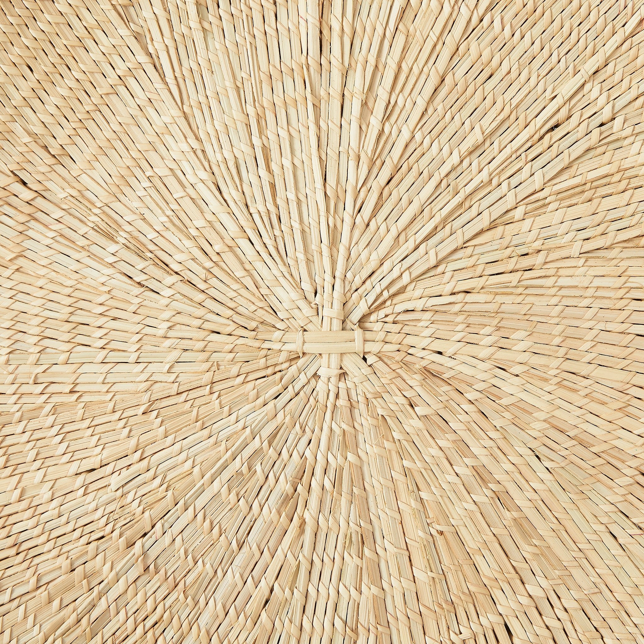 Close-up: BY NATIVE Sun Plate Medium, hand-woven from palm leaves in Malawi