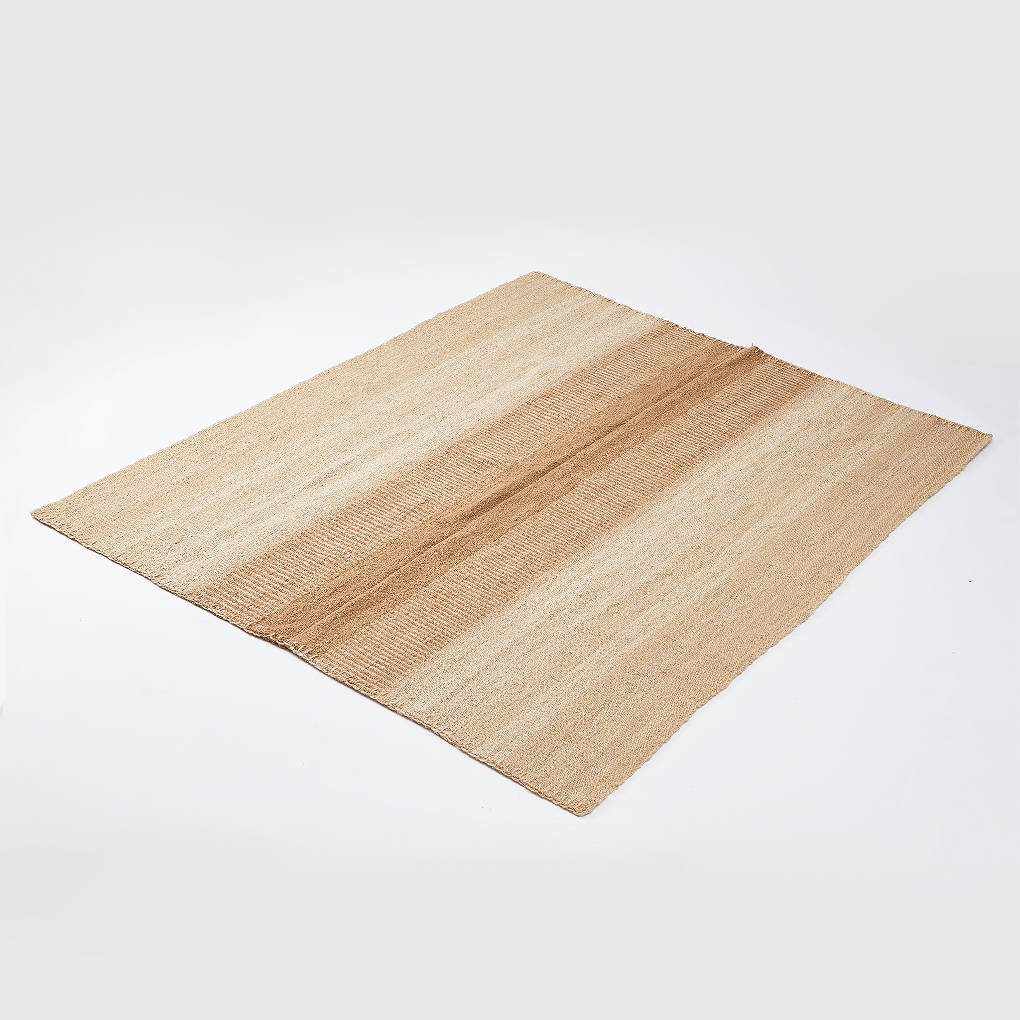 Hand-woven Cuyo carpet from the north of Argentina. A unique designer piece that combines softness and warmth with the positive energy of sustainability. 